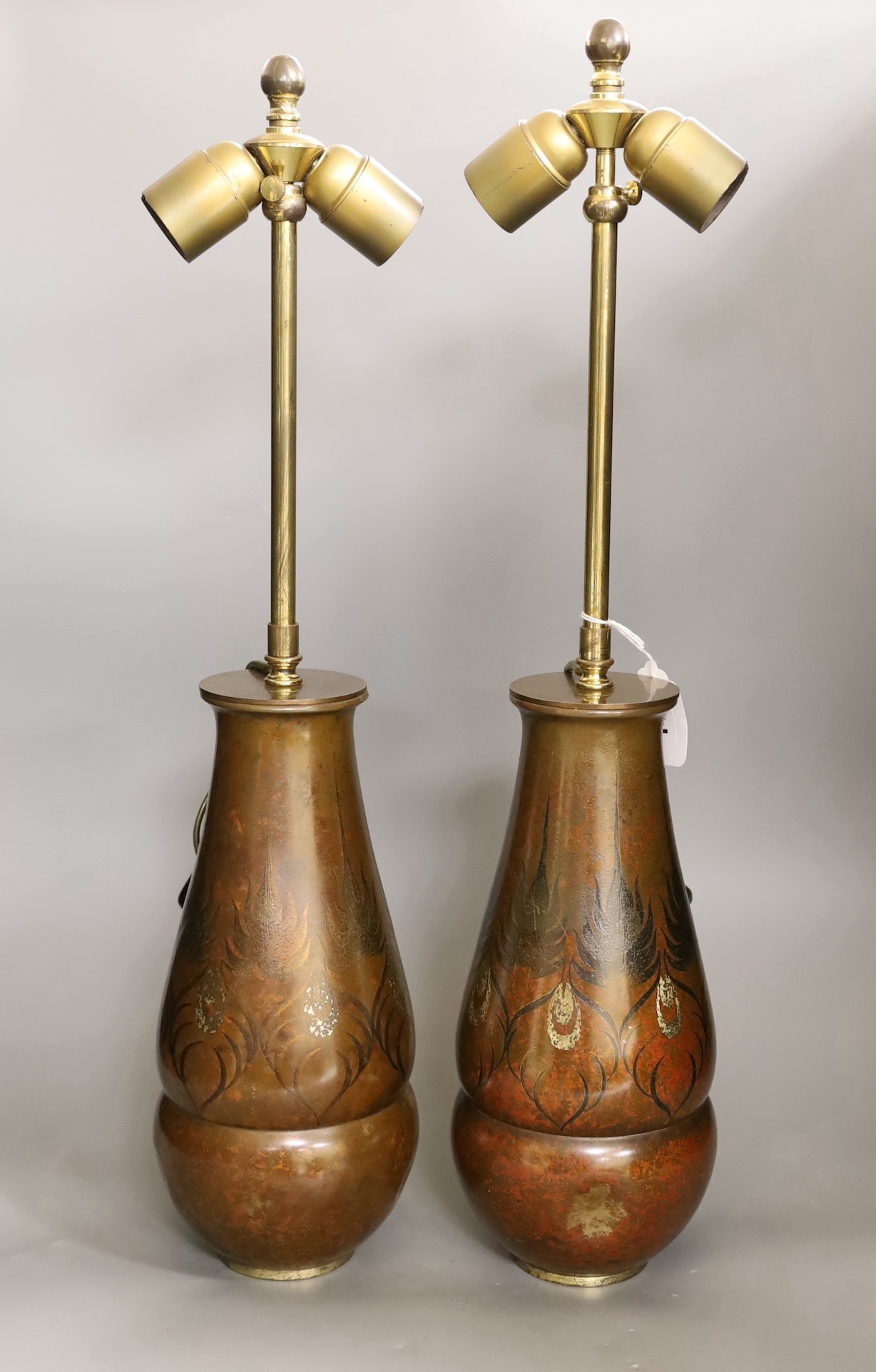 A pair of WMF Ikora bronze vases, converted to lamps, vases 31cm high